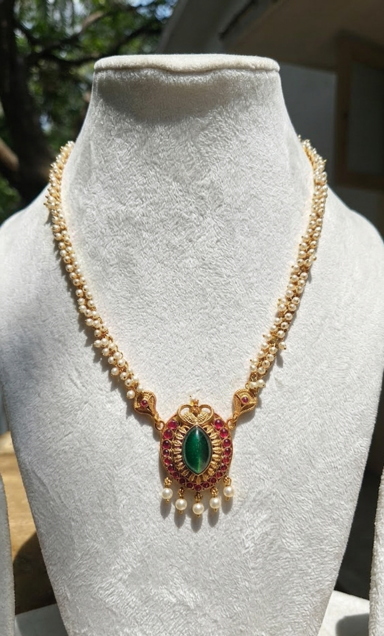 Pearl Chandrika Haaram with Green Gemstone Pendant and Earrings